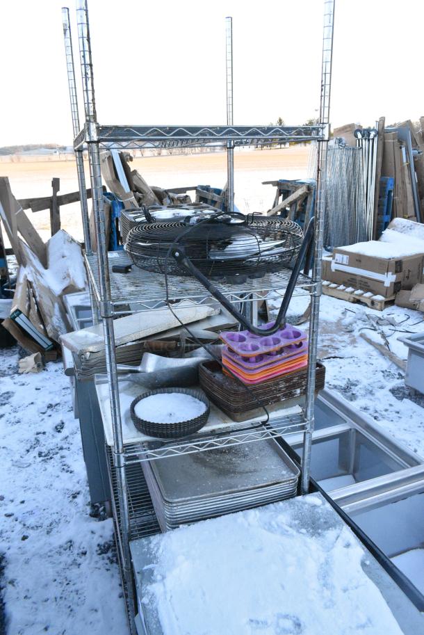 Chrome Finish 5 Tier Wire Shelving Unit on w/ Contents Including Metal Baking Pans and Fan. BUYER MUST DISMANTLE. PCI CANNOT DISMANTLE FOR SHIPPING. PLEASE CONSIDER FREIGHT CHARGES. - Image 2 of 5