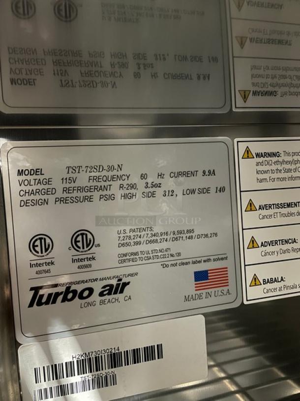 BRAND NEW! IN THE BOX! Turbo Air Super Deluxe Series Commercial Stainless Steel 3 Door Refrigerated Bain Marie Style Mega Top Sald/Sandwich Prep Table! With Poly Coated Wire Racks! With Clear Polycarbonate Food Pans! With Full Length Removable Cutting Board! Model: TST-72SD-30-N SN: H2KM730I30214! 115V 1 Phase! With Casters! - Image 11 of 14
