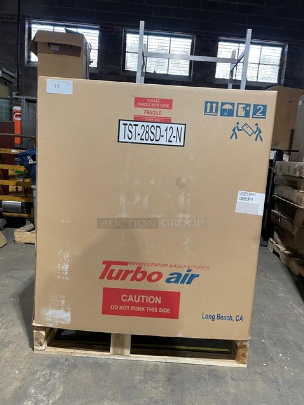 BRAND NEW! IN THE BOX! Turbo Air Super Deluxe Series Commercial Stainless Steel 1 Door Refrigerated Bain Marie Style Mega Top Sald/Sandwich Prep Table! With Chrome Plated Wire Racks! With Removable Cutting Board! With Clear Polycarbonate Food Pans! Model: TST-28SD-12-N SN: H2VTM2RI3003! 115V 1 Phase! With Casters! - Image 2 of 14