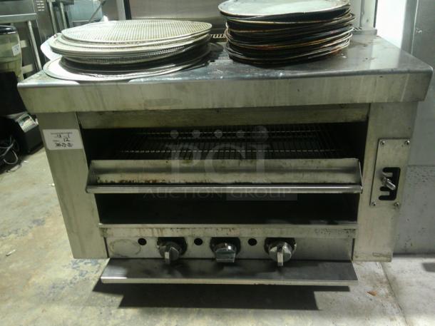 NICE Countertop Pizza Oven With Pans Included! Trays slide out, nice compact oven! - Image 1 of 7