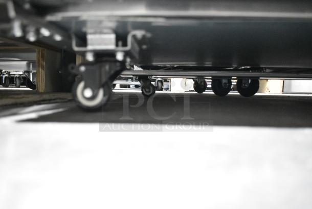 BRAND NEW SCRATCH AND DENT! 2024 Migali C-U72R-HC Stainless Steel Commercial 3 Door Work Top Cooler on Commercial Casters. 115 Volts, 1 Phase. Serial C-U72R-HCN5CT008. Tested and Working! - Image 4 of 8