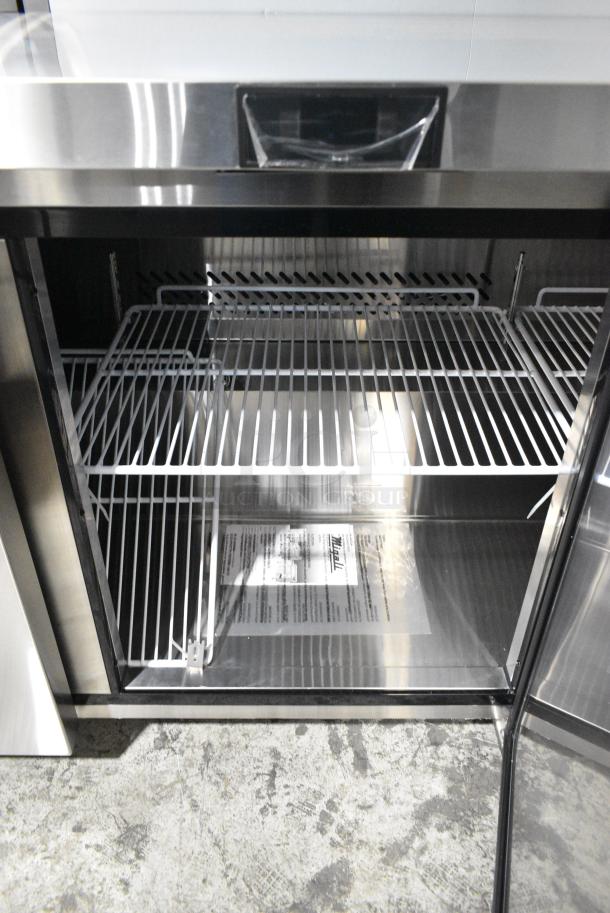 BRAND NEW SCRATCH AND DENT! 2024 Migali C-U72R-HC Stainless Steel Commercial 3 Door Work Top Cooler on Commercial Casters. 115 Volts, 1 Phase. Serial C-U72R-HCN5CT008. Tested and Working! - Image 6 of 8