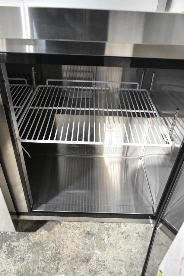 BRAND NEW SCRATCH AND DENT! 2024 Migali C-U72R-HC Stainless Steel Commercial 3 Door Work Top Cooler on Commercial Casters. 115 Volts, 1 Phase. Serial C-U72R-HCN5CT008. Tested and Working! - Image 7 of 8