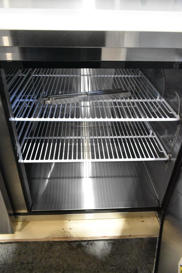 BRAND NEW SCRATCH AND DENT! 2024 Migali C-PP67-HC Stainless Steel Commercial Pizza Prep Table. 115 Volts, 1 Phase. Serial C-PP67-HC240424C005. Tested and Working! - Image 7 of 8