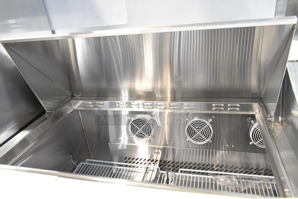 BRAND NEW SCRATCH AND DENT! 2023 Migali C-SP72-30BT-HC Stainless Steel Commercial Sandwich Salad Prep Table Bain Marie Mega Top on Commercial Casters. 115 Volts, 1 Phase. Serial C-SP72-30BT-H003231101092C0005. Tested and Working! - Image 7 of 14