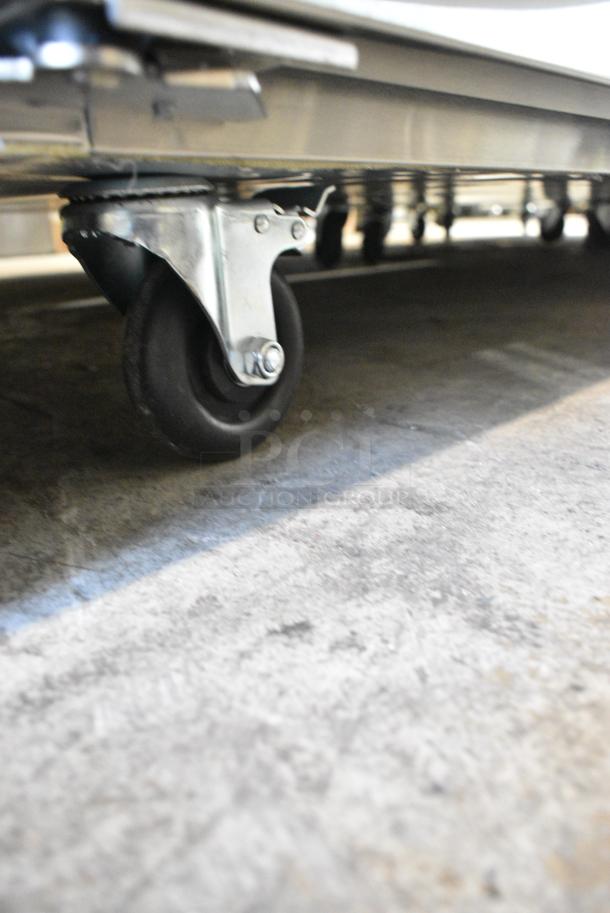BRAND NEW SCRATCH AND DENT! 2024 Migali C-3F-HC Stainless Steel Commercial 3 Door Reach In Freezer w/ Poly Coated Racks on Commercial Casters. 115/208-240 Volts, 1 Phase. Serial C-3F-HC240525C005. - Image 4 of 8