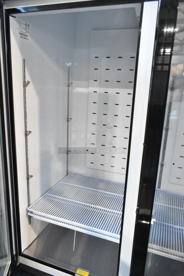 BRAND NEW SCRATCH AND DENT! 2024 Migali C-72FM-HC Metal Commercial 3 Door Reach In Freezer Merchandiser w/ Poly Coated Racks on Commercial Casters. Serial C-72FM-HC240402C007. Tested and Working! - Image 4 of 8
