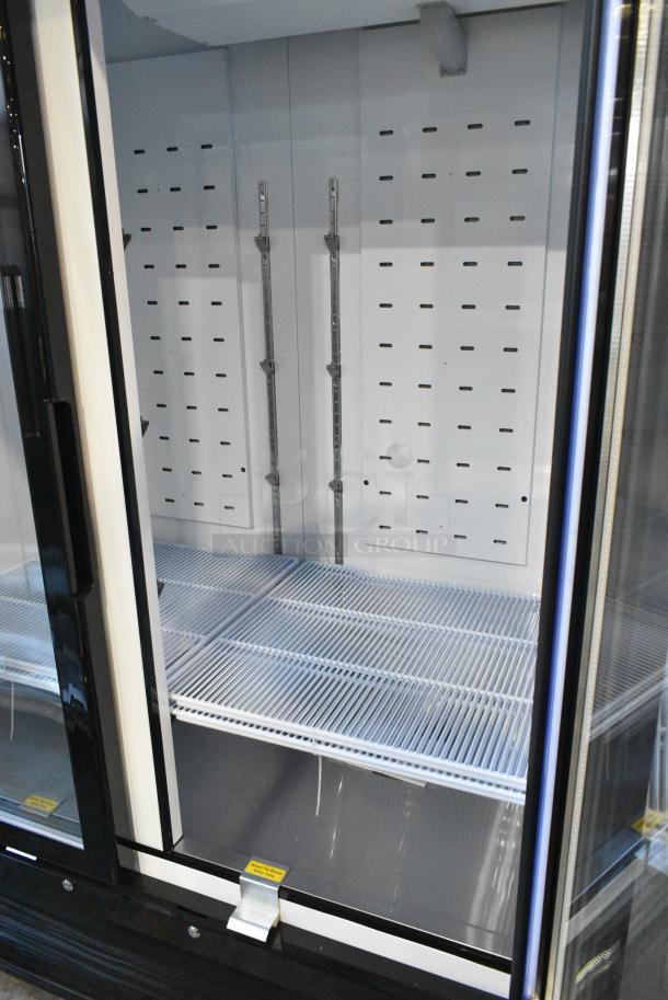 BRAND NEW SCRATCH AND DENT! 2024 Migali C-72FM-HC Metal Commercial 3 Door Reach In Freezer Merchandiser w/ Poly Coated Racks on Commercial Casters. Serial C-72FM-HC240402C007. Tested and Working! - Image 5 of 8