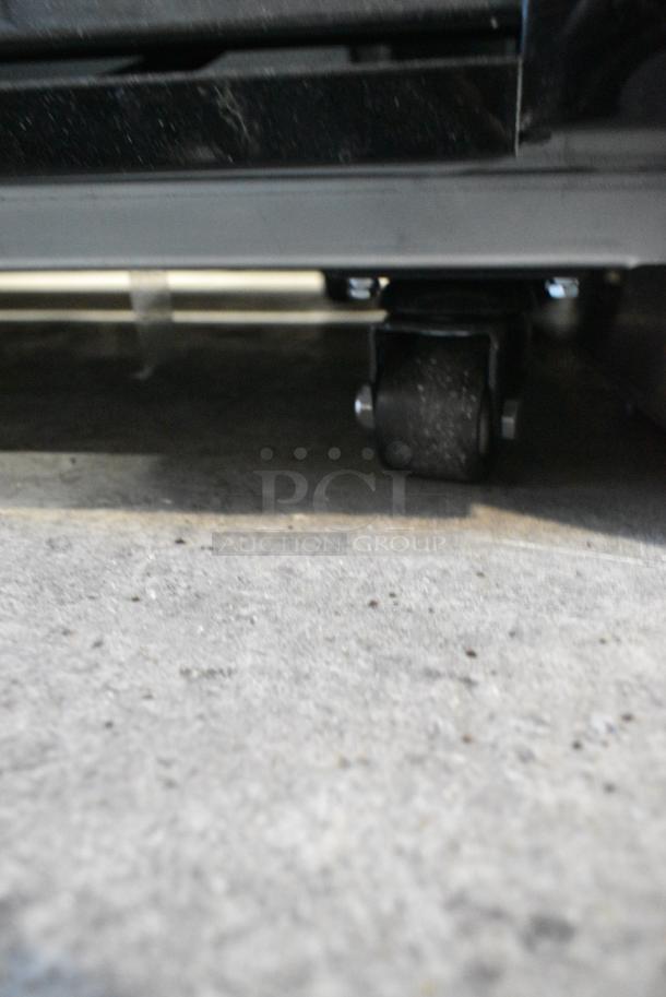 BRAND NEW SCRATCH AND DENT! 2024 Migali C-72FM-HC Metal Commercial 3 Door Reach In Freezer Merchandiser w/ Poly Coated Racks on Commercial Casters. Serial C-72FM-HC240402C007. Tested and Working! - Image 7 of 8