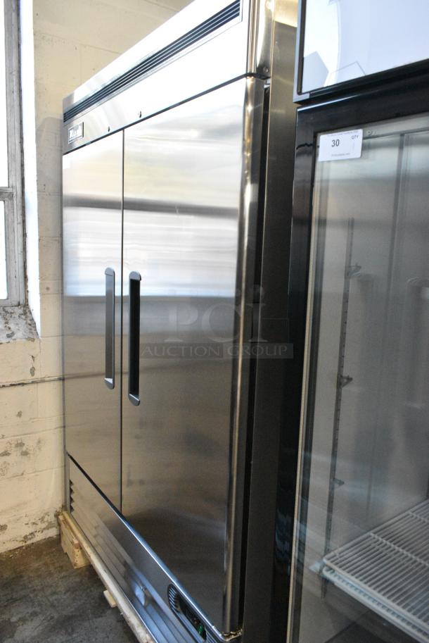 BRAND NEW SCRATCH AND DENT! 2024 Migali C-2FB-HC Stainless Steel Commercial 2 Door Reach In Freezer w/ Poly Coated Racks on Commercial Casters. 115 Volts, 1 Phase. Serial C-2FB-HC240530C007. Tested and Working! - Image 3 of 7