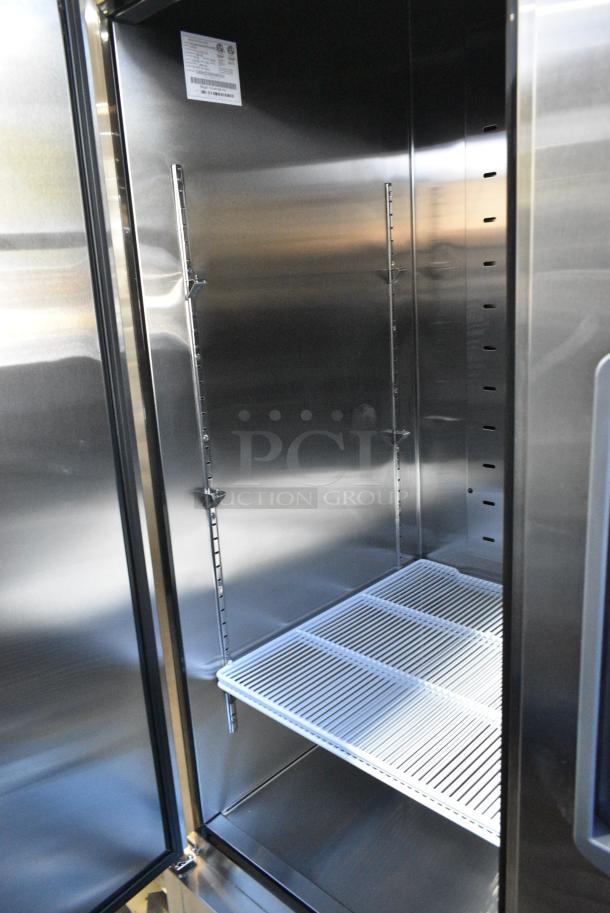 BRAND NEW SCRATCH AND DENT! 2023 Migali C-3FB-HC Stainless Steel Commercial 3 Door Reach In Freezer w/ Poly Coated Racks on Commercial Casters.  115/208-240 Volts, 1 Phase. Serial C-3FB-HCT03230724092T0015. - Image 4 of 7