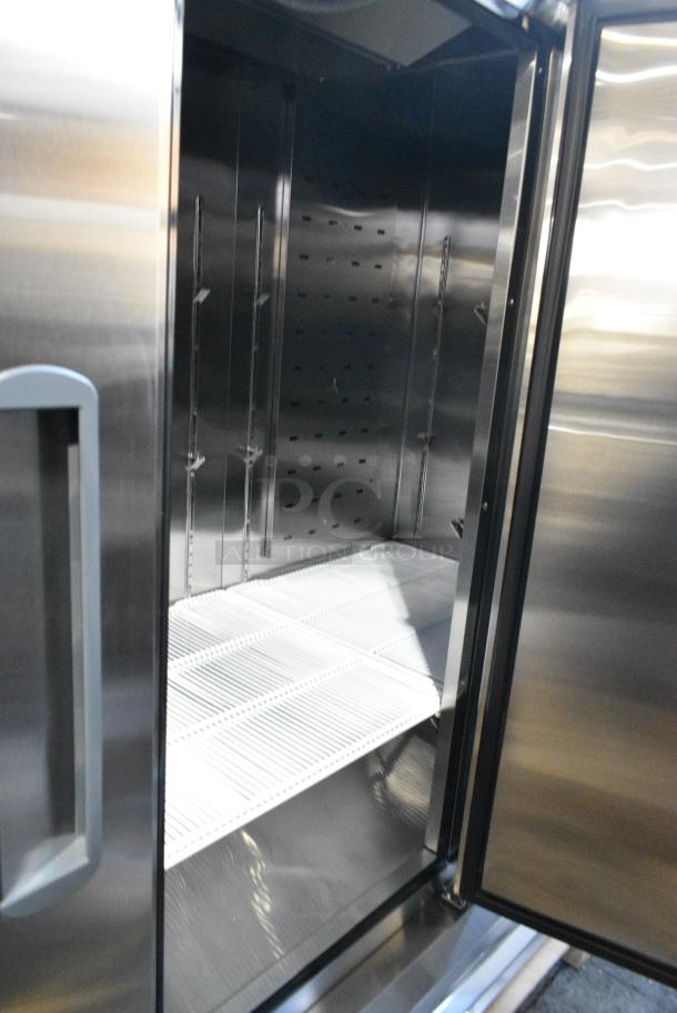 BRAND NEW SCRATCH AND DENT! 2023 Migali C-3FB-HC Stainless Steel Commercial 3 Door Reach In Freezer w/ Poly Coated Racks on Commercial Casters.  115/208-240 Volts, 1 Phase. Serial C-3FB-HCT03230724092T0015. - Image 5 of 7