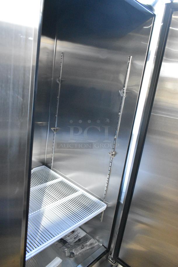 BRAND NEW SCRATCH AND DENT! 2023 Migali C-3FB-HC Stainless Steel Commercial 3 Door Reach In Freezer w/ Poly Coated Racks on Commercial Casters.  115/208-240 Volts, 1 Phase. Serial C-3FB-HCT03230724092T0015. - Image 6 of 7