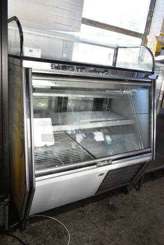 2020 Leader SDL48SC Metal Commercial Deli Display Case Merchandiser w/ Top Dry Display Case on Commercial Casters. 115 Volts, 1 Phase. Tested and Powers On But Does Not Get Cold