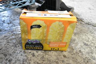 Box of Swiffer Dusters.