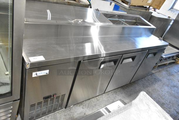 BRAND NEW SCRATCH AND DENT! 2024 Avantco 178APPT91HC Stainless Steel Commercial 92" 3 Door Refrigerated Pizza Prep Table on Commercial Casters. 115 Volts, 1 Phase. Tested and Working! - Image 1 of 12