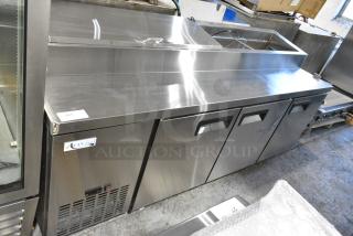 BRAND NEW SCRATCH AND DENT! 2024 Avantco 178APPT91HC Stainless Steel Commercial 92" 3 Door Refrigerated Pizza Prep Table on Commercial Casters. 115 Volts, 1 Phase. Tested and Working!