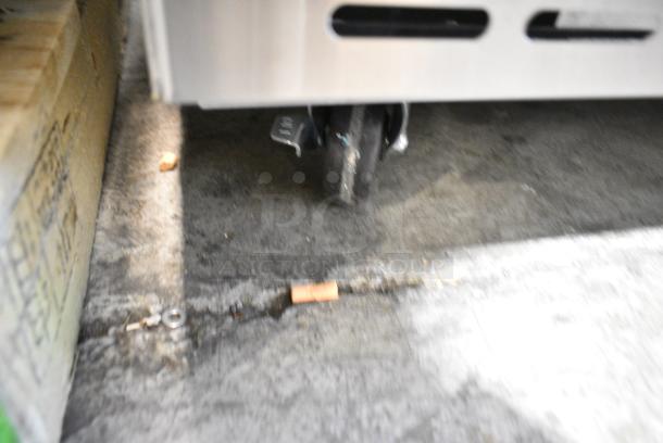 BRAND NEW SCRATCH AND DENT! 2024 Avantco 178APPT91HC Stainless Steel Commercial 92" 3 Door Refrigerated Pizza Prep Table on Commercial Casters. 115 Volts, 1 Phase. Tested and Working! - Image 3 of 12