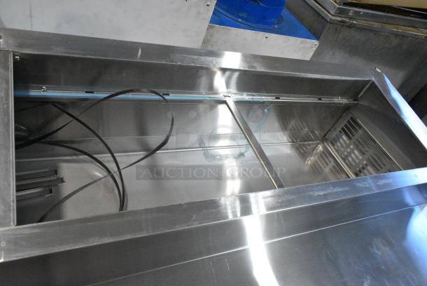 BRAND NEW SCRATCH AND DENT! 2024 Avantco 178APPT91HC Stainless Steel Commercial 92" 3 Door Refrigerated Pizza Prep Table on Commercial Casters. 115 Volts, 1 Phase. Tested and Working! - Image 6 of 12