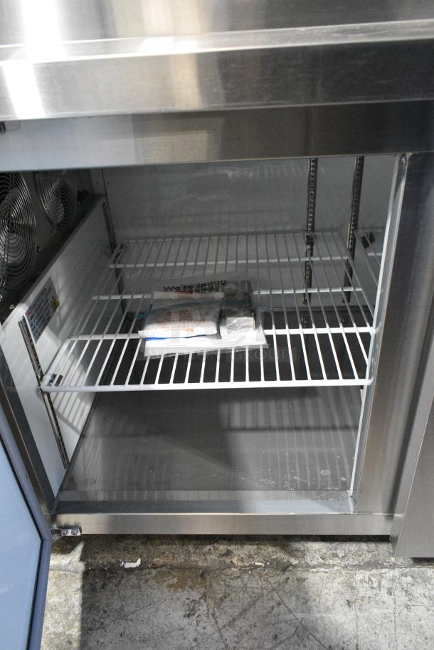 BRAND NEW SCRATCH AND DENT! 2024 Avantco 178APPT91HC Stainless Steel Commercial 92" 3 Door Refrigerated Pizza Prep Table on Commercial Casters. 115 Volts, 1 Phase. Tested and Working! - Image 7 of 12