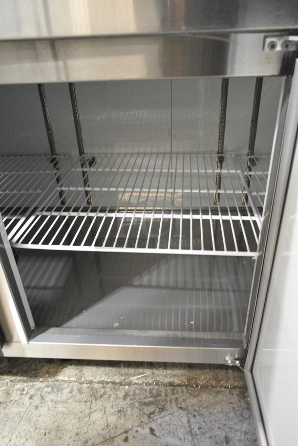 BRAND NEW SCRATCH AND DENT! 2024 Avantco 178APPT91HC Stainless Steel Commercial 92" 3 Door Refrigerated Pizza Prep Table on Commercial Casters. 115 Volts, 1 Phase. Tested and Working! - Image 8 of 12