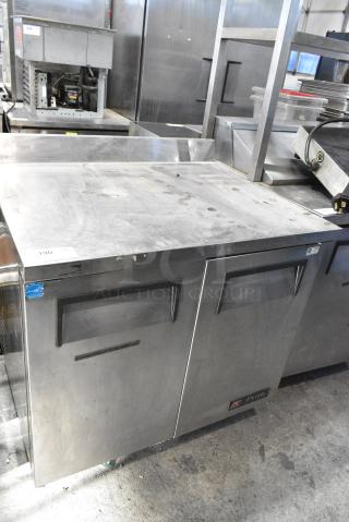 True TSSU-48-12 Stainless Steel Commercial 2 Door Work Top Cooler on Commercial Casters. 115 Volts, 1 Phase. Tested and Working!
