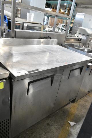 2018 True TWT-48-HC Stainless Steel Commercial 2 Door Work Top Cooler on Commercial Casters. 115 Volts, 1 Phase. Tested and Powers On But Does Not Get Cold