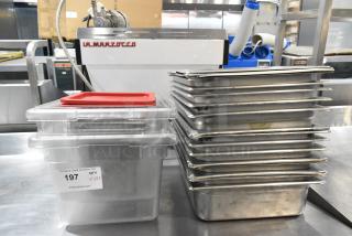 23 Various Items Including Stainless Steel 1/2 Size Drop In Bins, Poly Bins and Lids. 23 Times Your Bid!