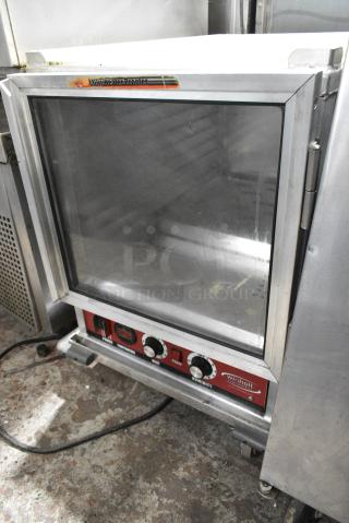 WinHolt NHPL-1810/HH-CA/LC Metal Commercial Heated Holding Cabinet on Commercial Casters. 120 Volts, 1 Phase. Tested and Powers On But Does Not Get Warm