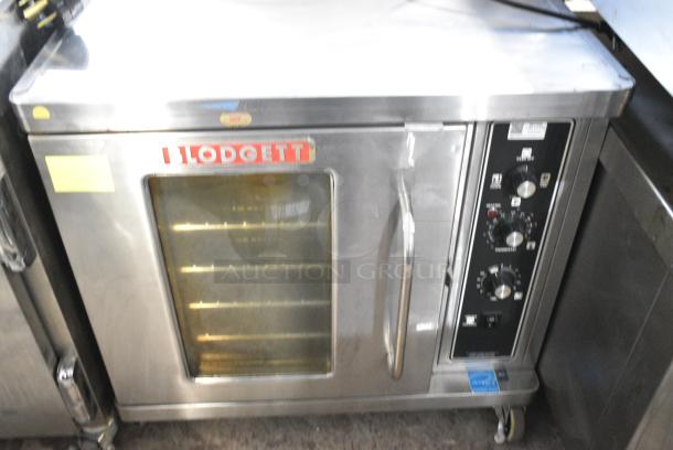 2019 Blodgett CTB-1 Stainless Steel Commercial Electric Powered Half Size Convection Oven w/ View Through Door, Metal Oven Racks and Thermostatic Controls on Commercial Casters. 208-240 Volts, 3 Phase. - Image 2 of 7