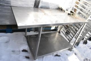 Stainless Steel Table w/ Under Shelf on Commercial Casters. 2 Casters Need To Be Reattached.