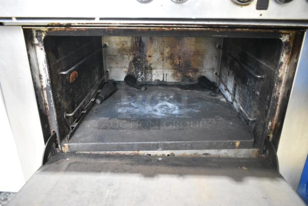 Stainless Steel Commercial Natural Gas Powered 6 Burner Range w/ Oven and Back Splash. - Image 7 of 7