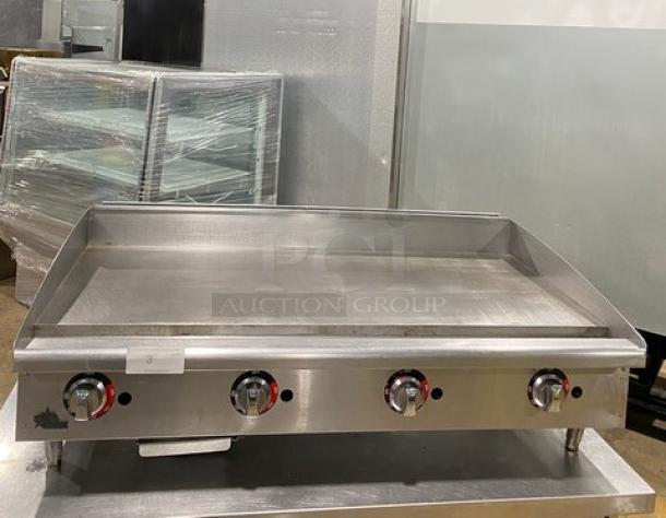 Star-Max Commercial Stainless Steel Natural Gas Powered Countertop Flat Griddle! With Back & Side Splash! With Thermostatic Controls! On Legs! - Image 1 of 8