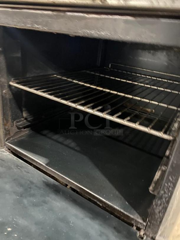 Imperial Commercial Stainless Steel Natural Gas Powered 4 Burner Range & Oven Combo! With Back Splash & Overhead Salamander Shelf! With Wire Oven Rack! On Legs! - Image 7 of 9