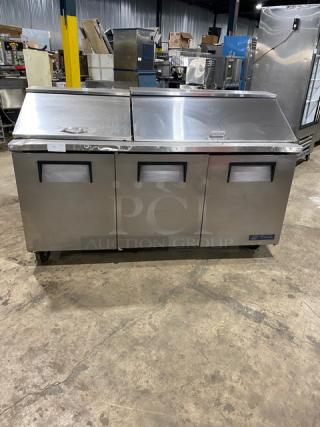 True Commercial Stainless Steel 3 Door Refrigerated Bain Marie Style Mega Top Salad/Sandwich Prep Table! With Poly Coated Wire Racks! Model: TSSU-72-18 SN: 1-4477571! 115V 1 Phase! On Casters!