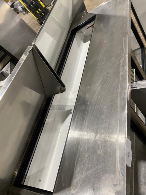 True Commercial Stainless Steel 3 Door Refrigerated Bain Marie Style Mega Top Salad/Sandwich Prep Table! With Poly Coated Wire Racks! Model: TSSU-72-18 SN: 1-4477571! 115V 1 Phase! On Casters! - Image 6 of 9