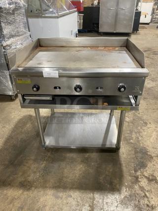 Jade Range Commercial Stainless Steel Natural Gas Powered Countertop Flat Griddle! With Thermostatic Controls! With Back & Side Splash! On Single Shelf Equipment Stand With Legs!