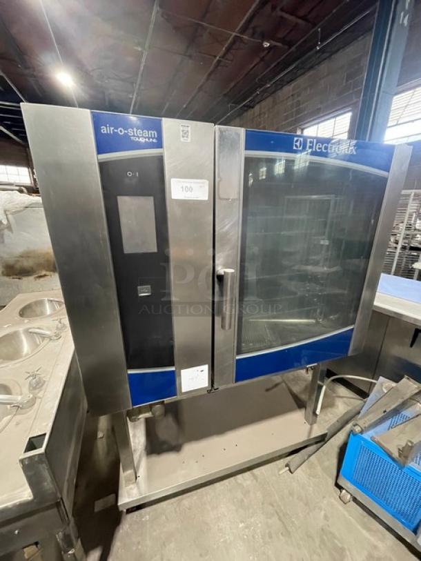 Electrolux Air-O-Steam Touchline Series Commercial Stainless Steel Natural Gas Powered Combi Convection Oven! With Wire Oven Racks! With Touchline Touch Controls! Model: AOS102GTP1 SN: 20404001! 120V 1 Phase! On Single Shelf Equipment Stand! - Image 1 of 9