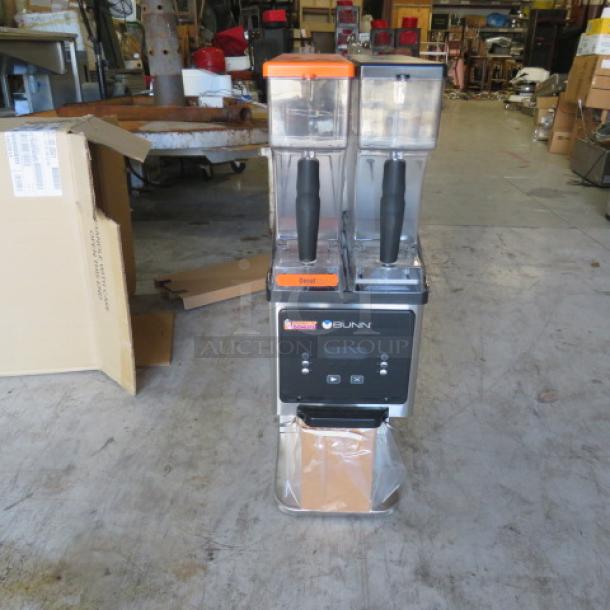 One NEW Bunn Dual Hopper Coffee Grinder. Model# MHG. 120 Volt. 9X16X29. $1827.10. - Image 1 of 3