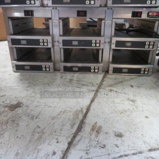 One Carter Hoffman Modular Heated holding Cabinet. Model# MC3W2SN01. 120 Volt. 28X12X12