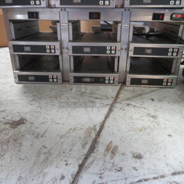 One Carter Hoffman Modular Heated holding Cabinet. Model# MC3W2SN01. 120 Volt. 28X12X12 - Image 1 of 2