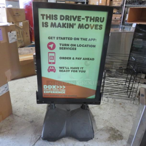One Dual Sided Outdoor Sign On Wheels. 27.5X22X49.5 - Image 1 of 2