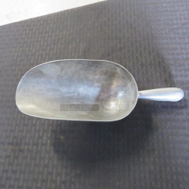 One 24oz Aluminum Scoop. - Image 1 of 1