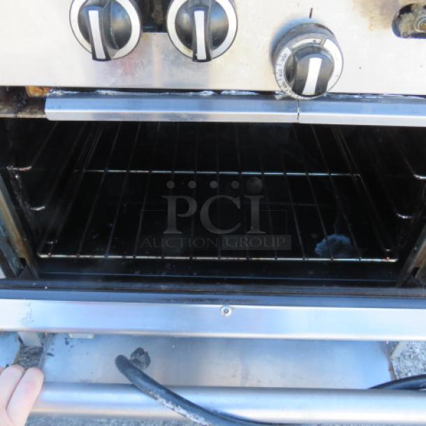 One Garland 10 Burner Natural Gas Range With SS Over Shelf On Casters. - Image 3 of 4