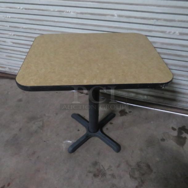 One Beige Laminate Table Top On A Pedestal Base. 24X30X29 - Image 1 of 1