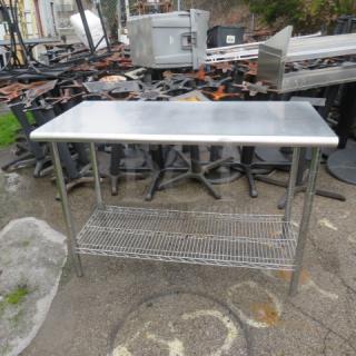 One Stainless Steel Table With Metro Under Shelf. 50X24X35