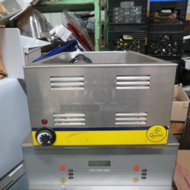 One Qualite Food Warmer. Model# FW-1200WF. 120 Volt. 1200 Watt. - Image 1 of 1