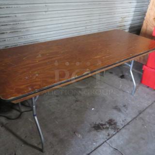 One Wooden Folding Table. 72X30X30