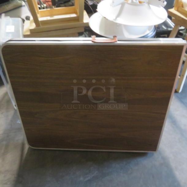 One Folding Table With A Laminate Top And A Carry Handle. 72X30X30 - Image 2 of 2