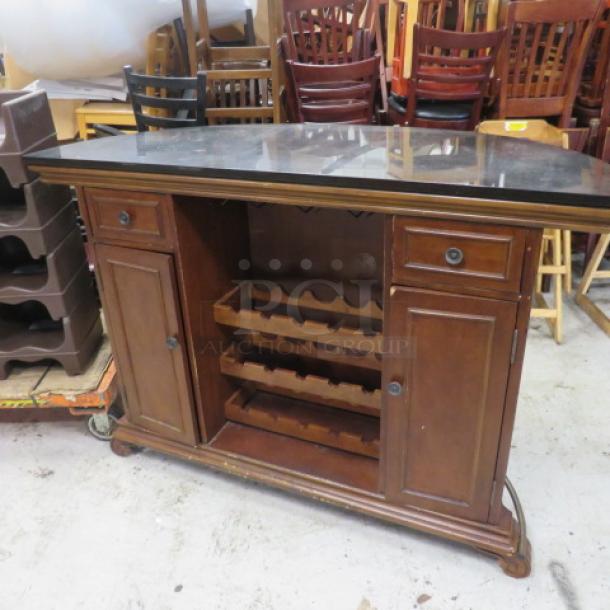 One Circular Wooden Wine Bar With A Black Granite Top, 2 Doors, 2 Drawers, Footrest, 3 Wine Bottle Shelves, And 4 Wine Glass Racks. 59X24X42 - Image 3 of 4